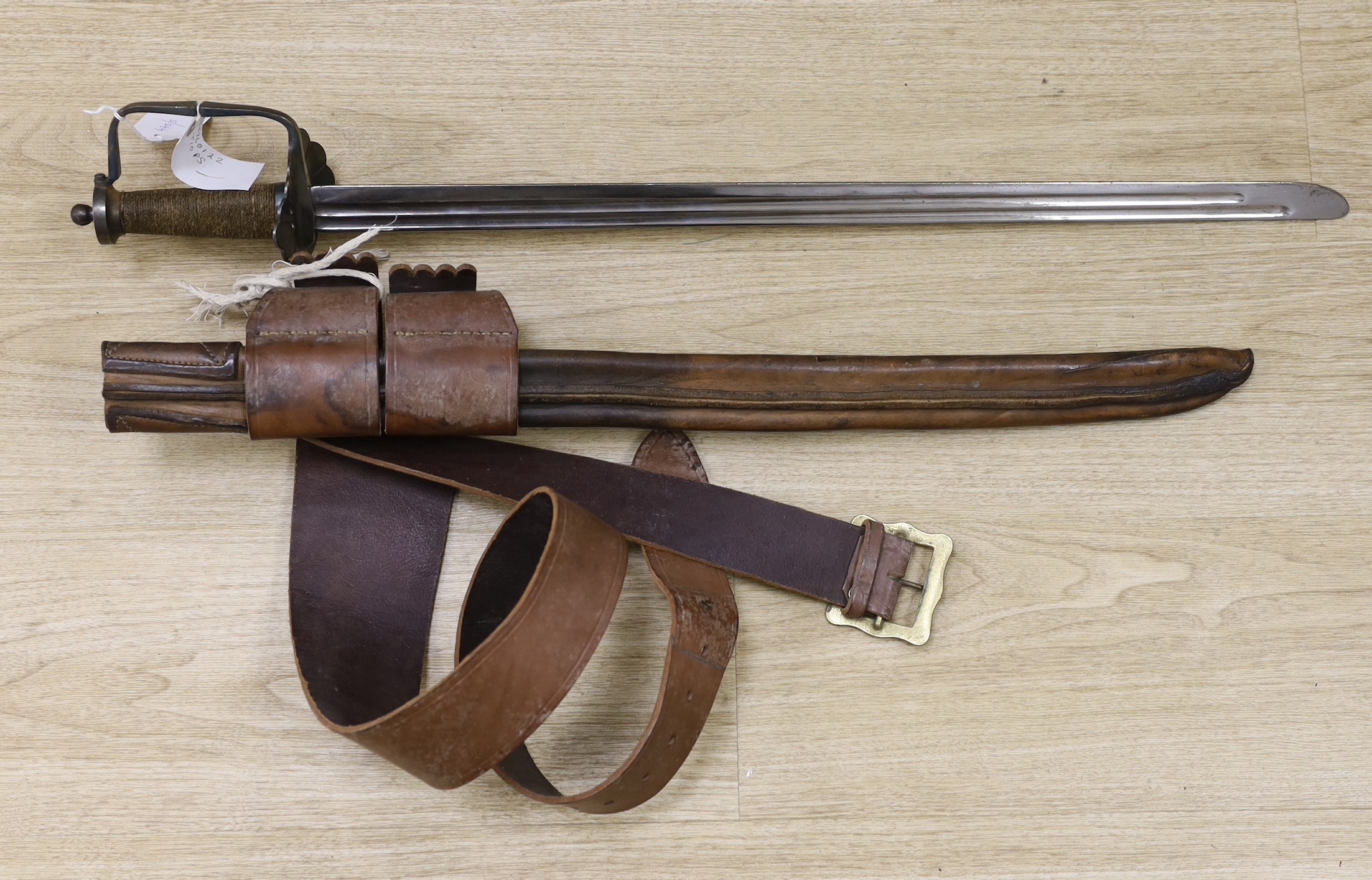 A Cromwellian style sword with leather scabbard and belt